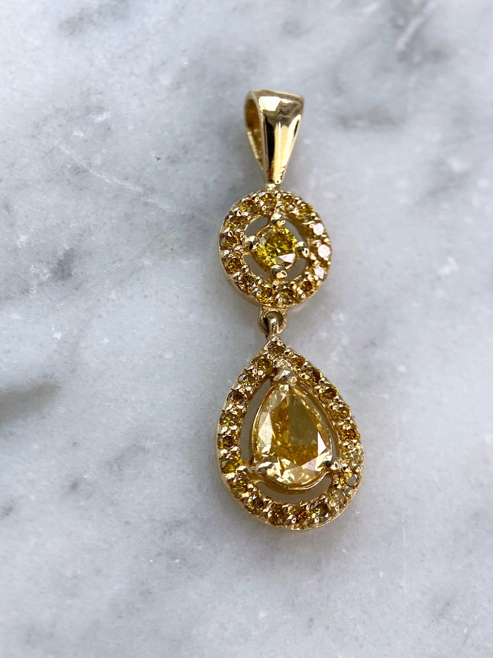 Yellow gold pendant with 0.36 ct fancy diamond: "Drop of Honey"