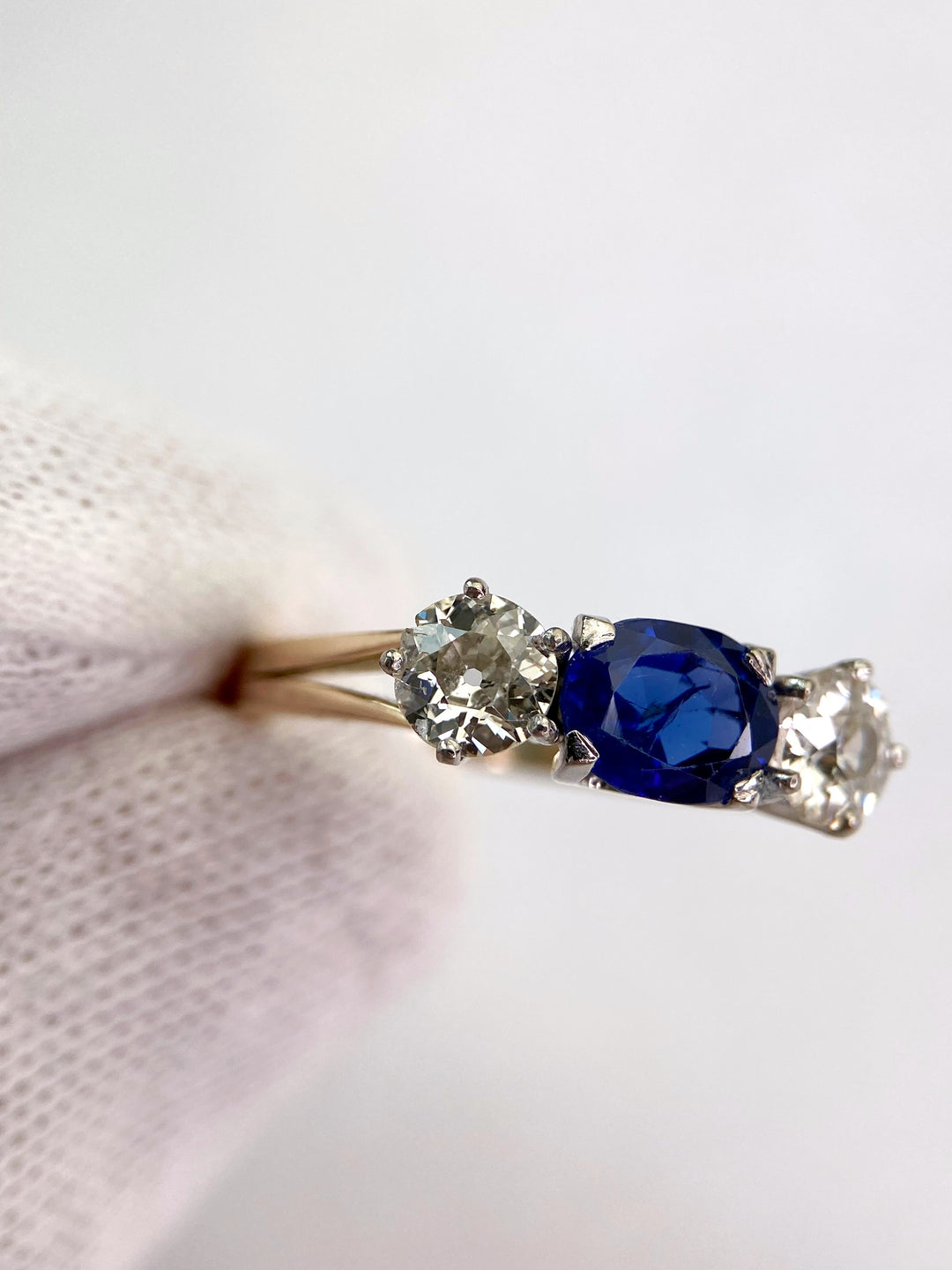 Blue 1.5 ct sapphire ring with two diamonds totaling 1.1 ct: "Rare Luck"