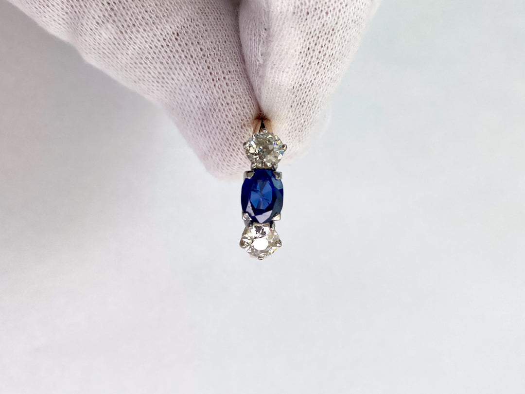 Blue 1.5 ct sapphire ring with two diamonds totaling 1.1 ct: "Rare Luck"