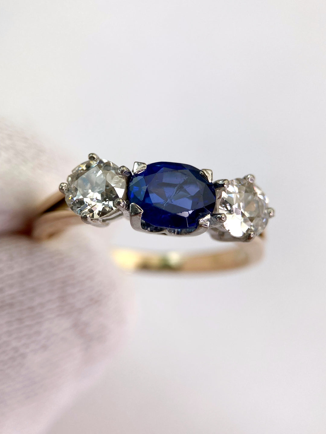 Blue 1.5 ct sapphire ring with two diamonds totaling 1.1 ct: "Rare Luck"