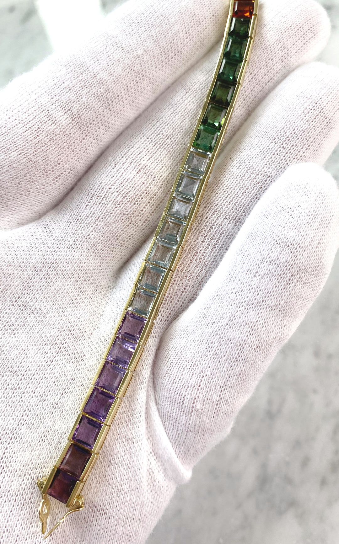 Luxurious tennis bracelet with tourmalines, citrines and topazes in gold: "Joy of the Rainbow"