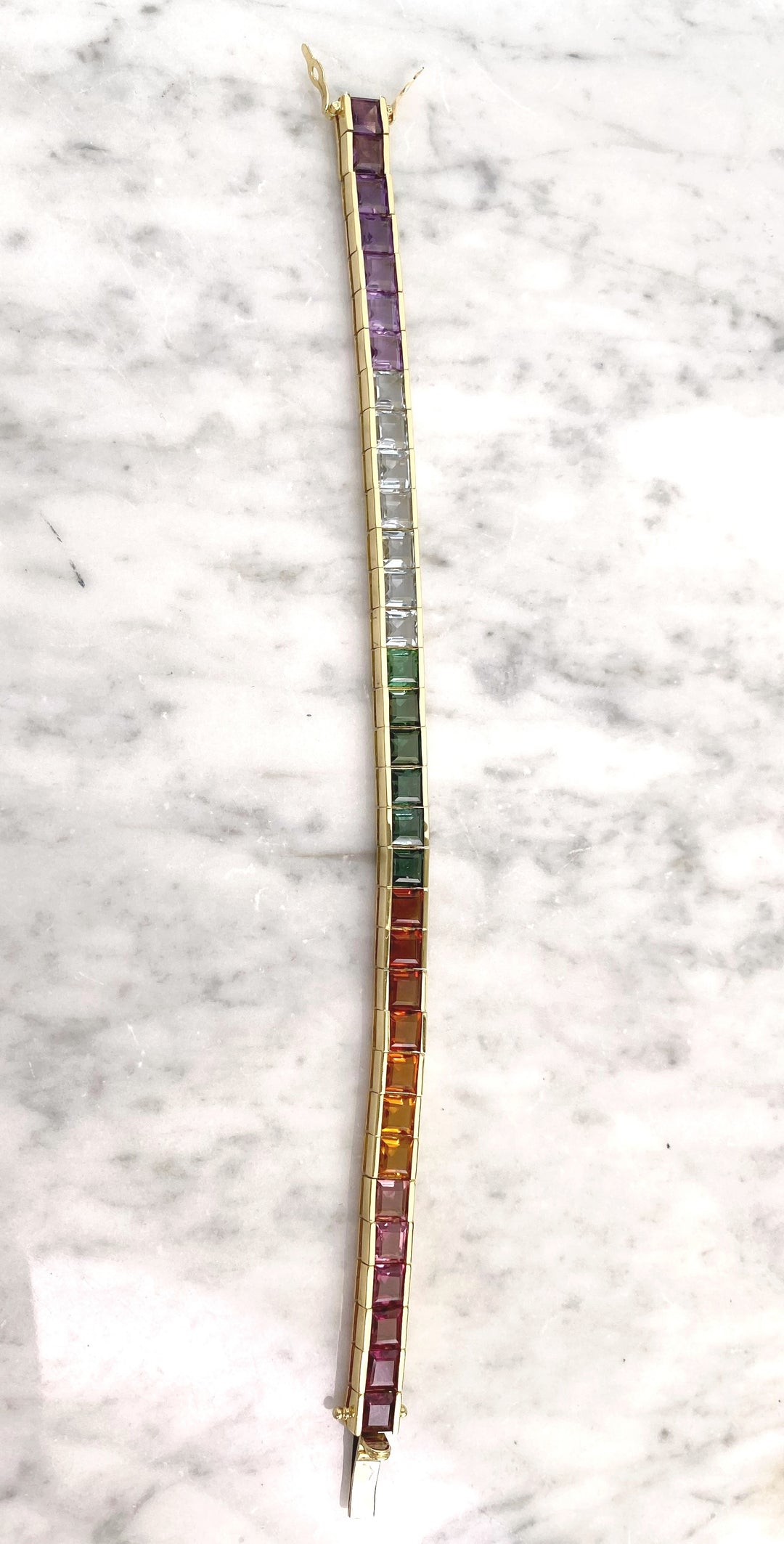Luxurious tennis bracelet with tourmalines, citrines and topazes in gold: "Joy of the Rainbow"