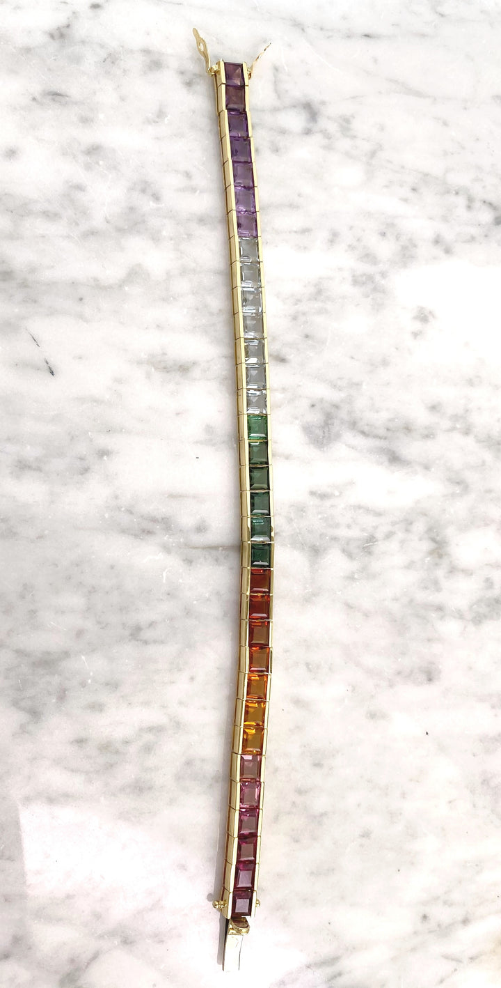 Luxurious tennis bracelet with tourmalines, citrines and topazes in gold: "Joy of the Rainbow"