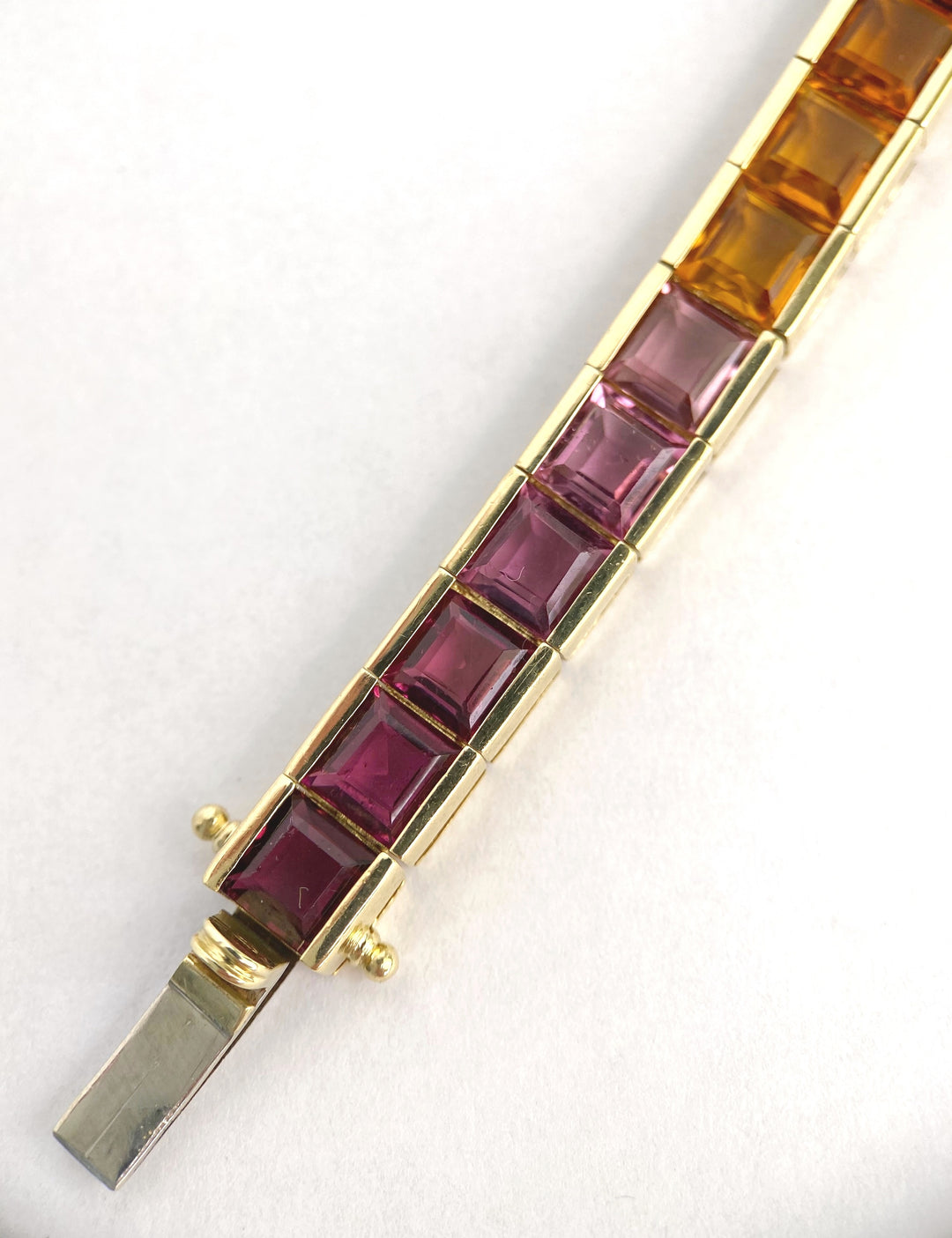 Luxurious tennis bracelet with tourmalines, citrines and topazes in gold: "Joy of the Rainbow"