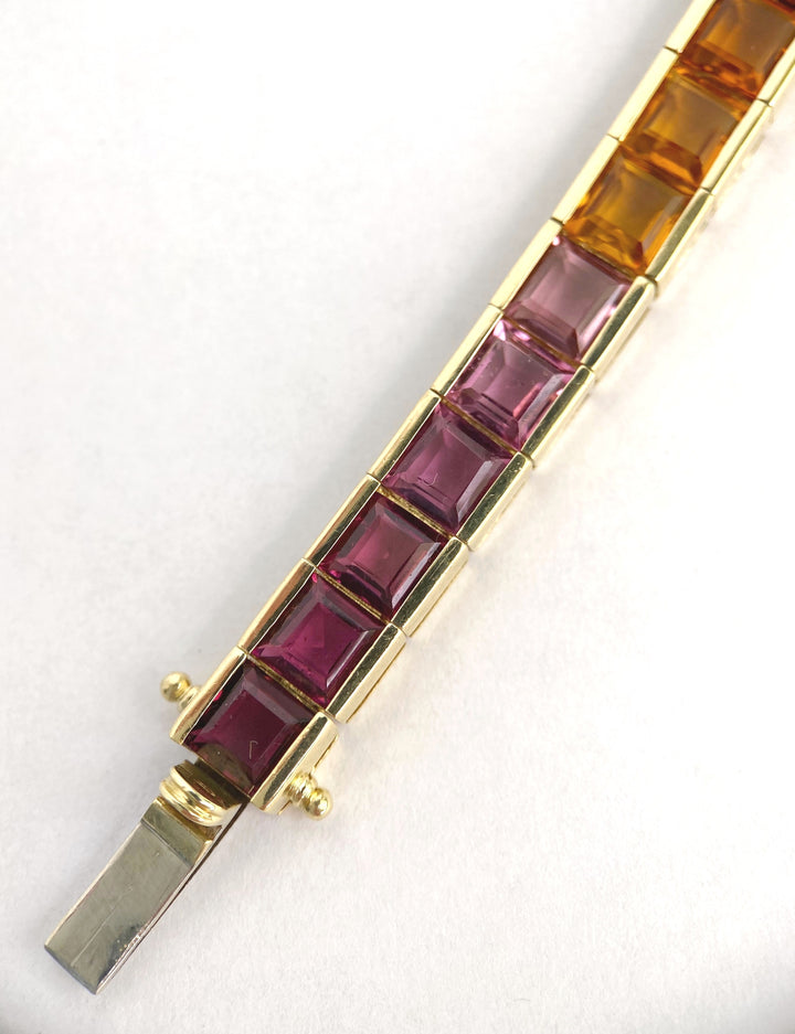 Luxurious tennis bracelet with tourmalines, citrines and topazes in gold: "Joy of the Rainbow"