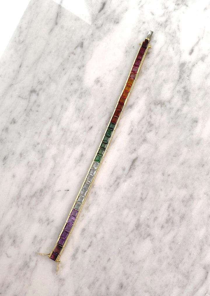 Luxurious tennis bracelet with tourmalines, citrines and topazes in gold: "Joy of the Rainbow"