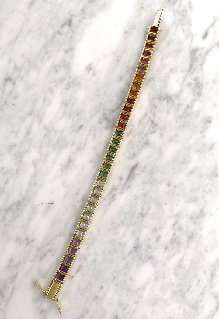 Luxurious tennis bracelet with tourmalines, citrines and topazes in gold: "Joy of the Rainbow"