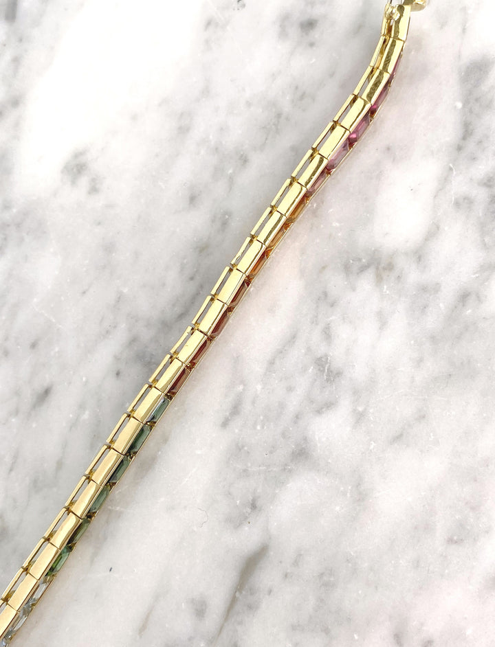 Luxurious tennis bracelet with tourmalines, citrines and topazes in gold: "Joy of the Rainbow"