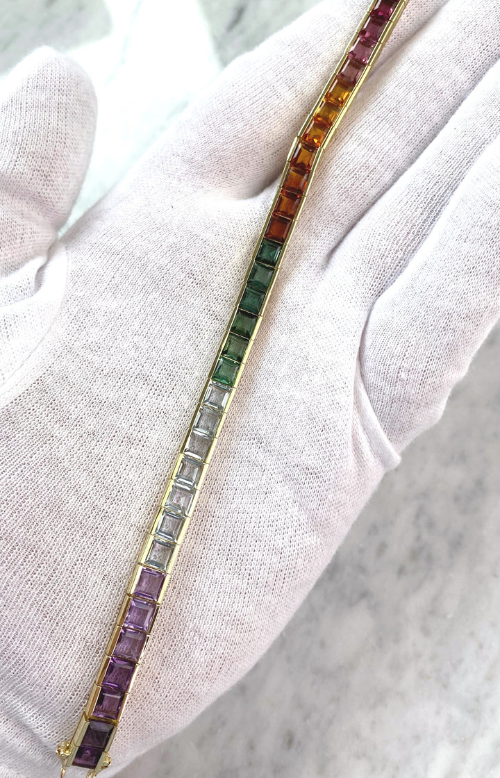 Luxurious tennis bracelet with tourmalines, citrines and topazes in gold: "Joy of the Rainbow"